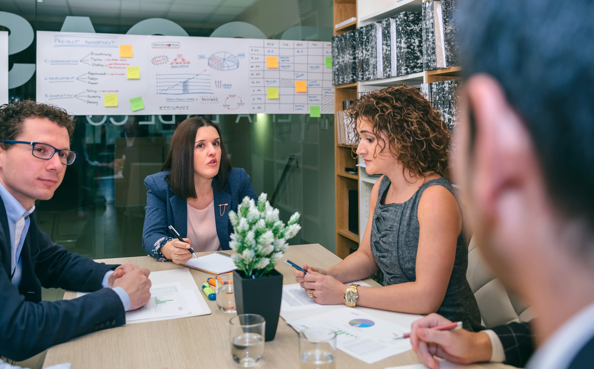 Businesswoman talking in a meeting to teamwork